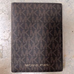 Michael Kors Passport Holder. Never used.